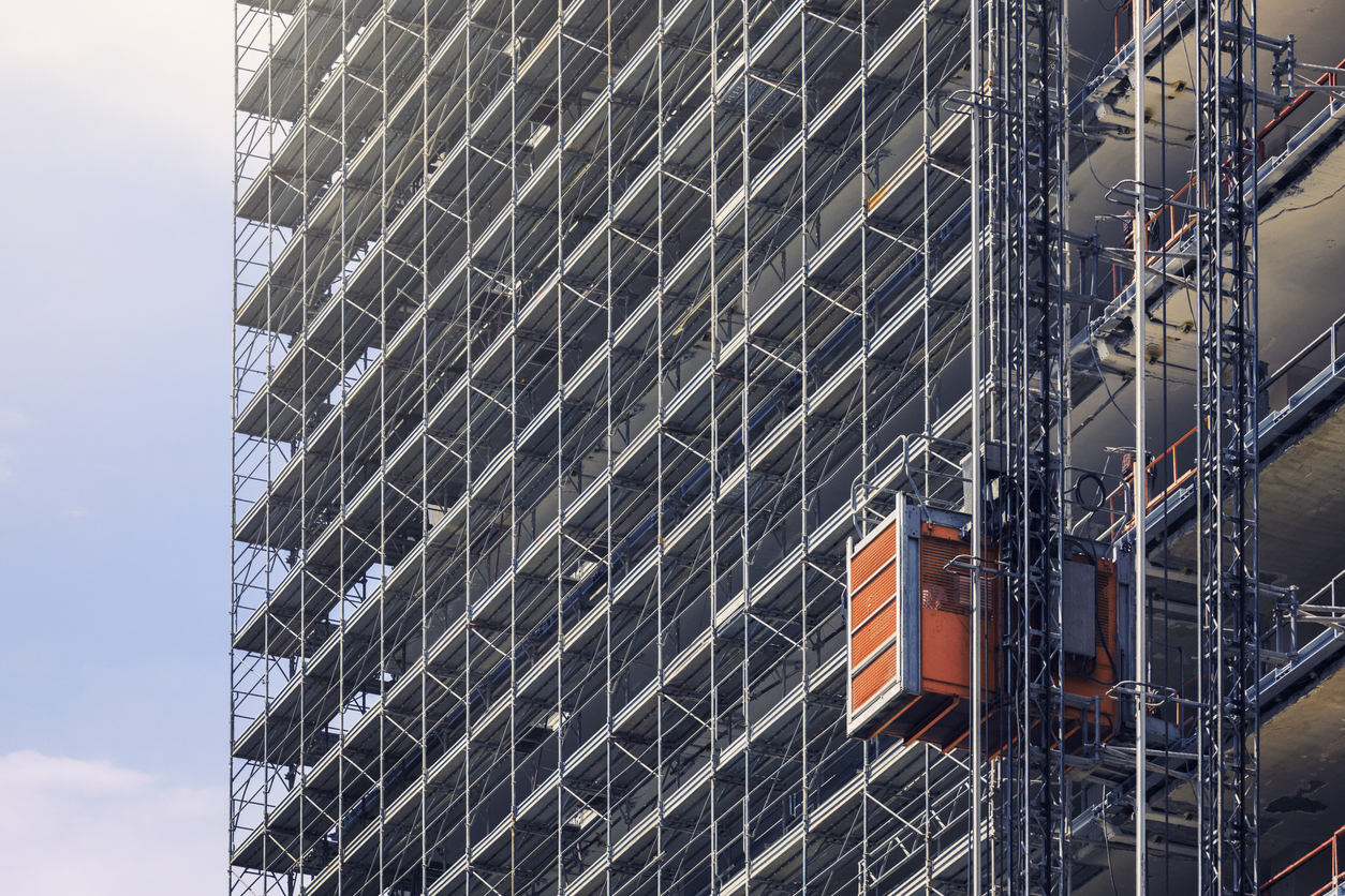 A goods hoist on a tall building under construction